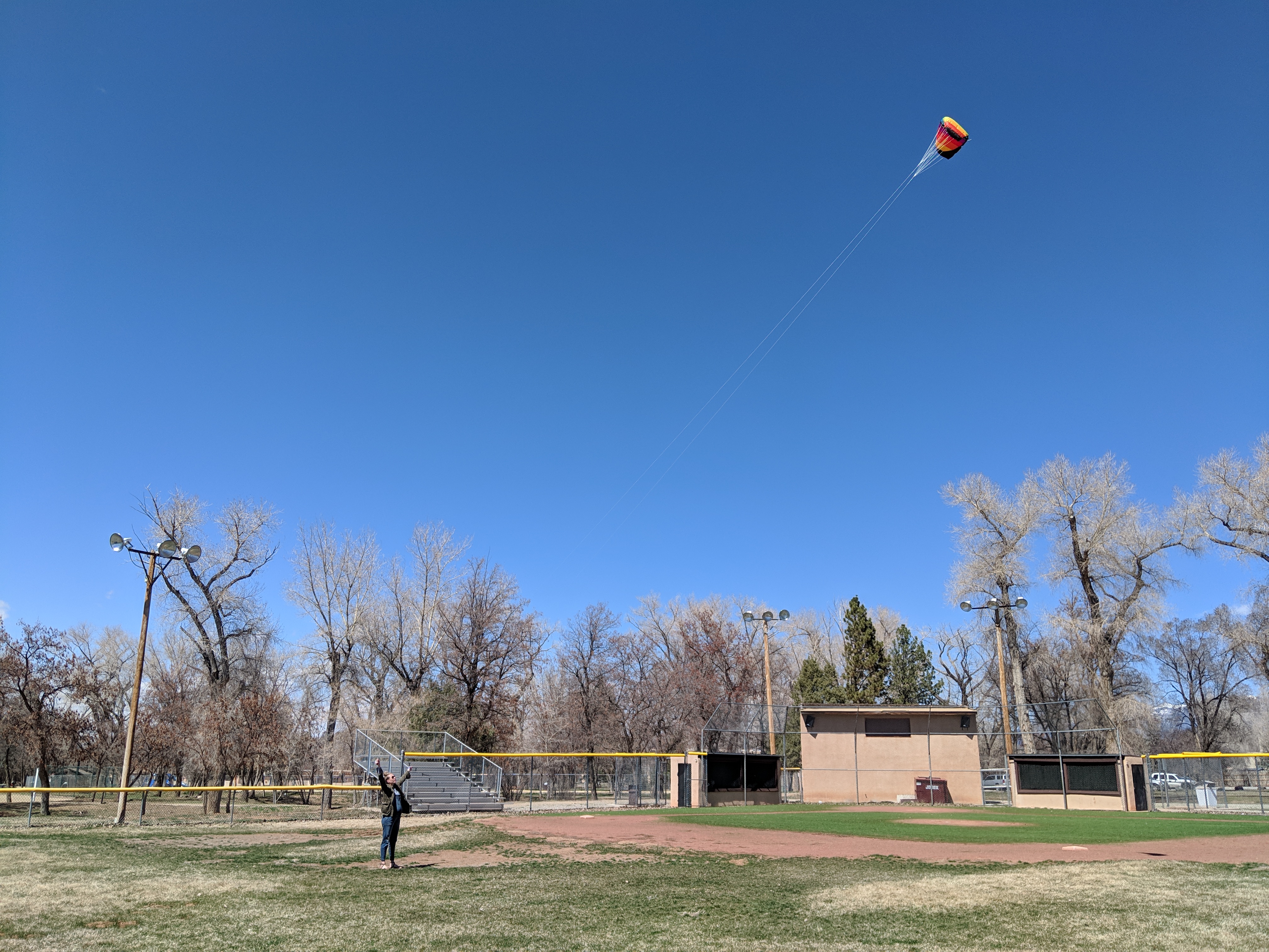 Katie flies a kite.