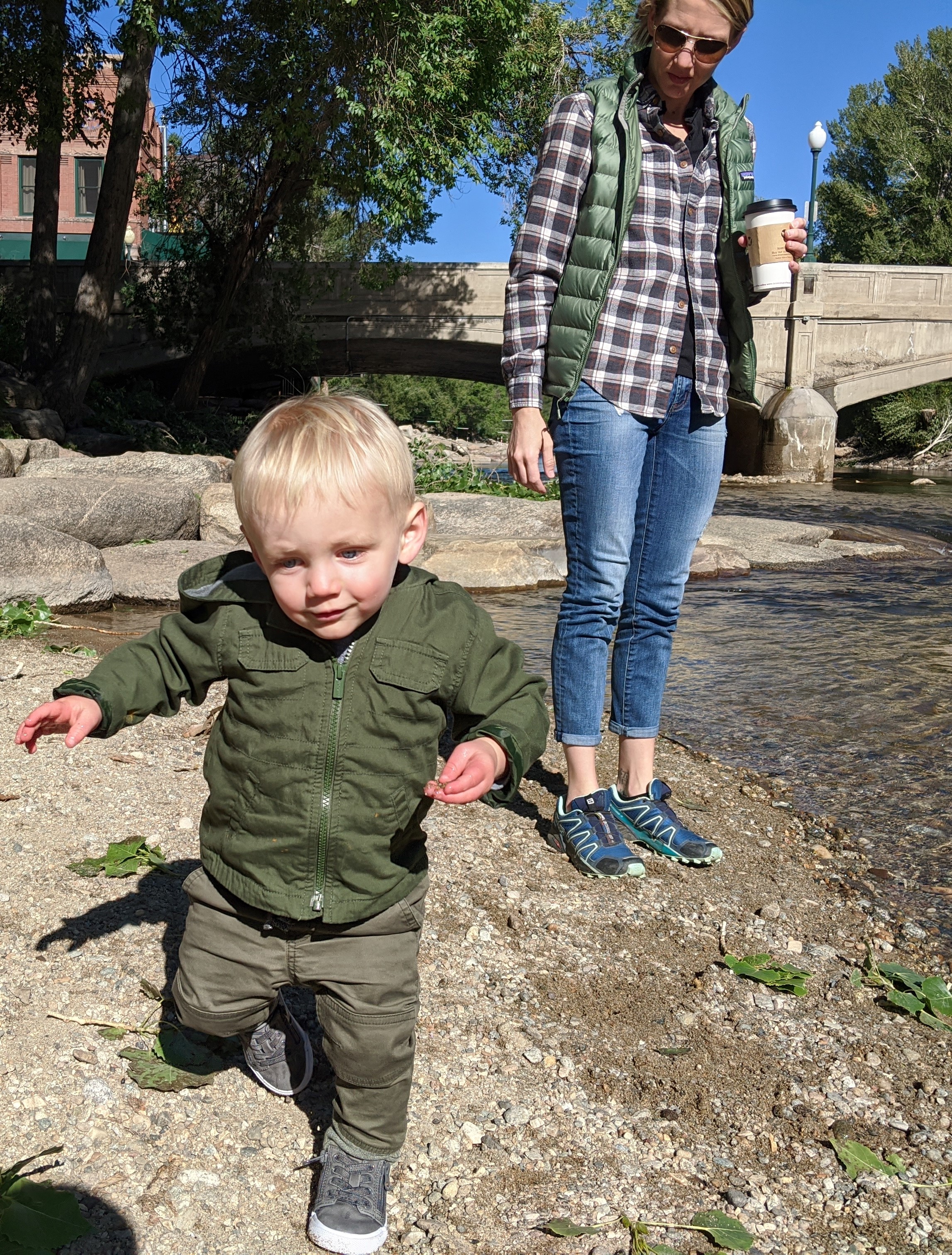 Katie and Owen on the bank of the Arkansas river in Salida.