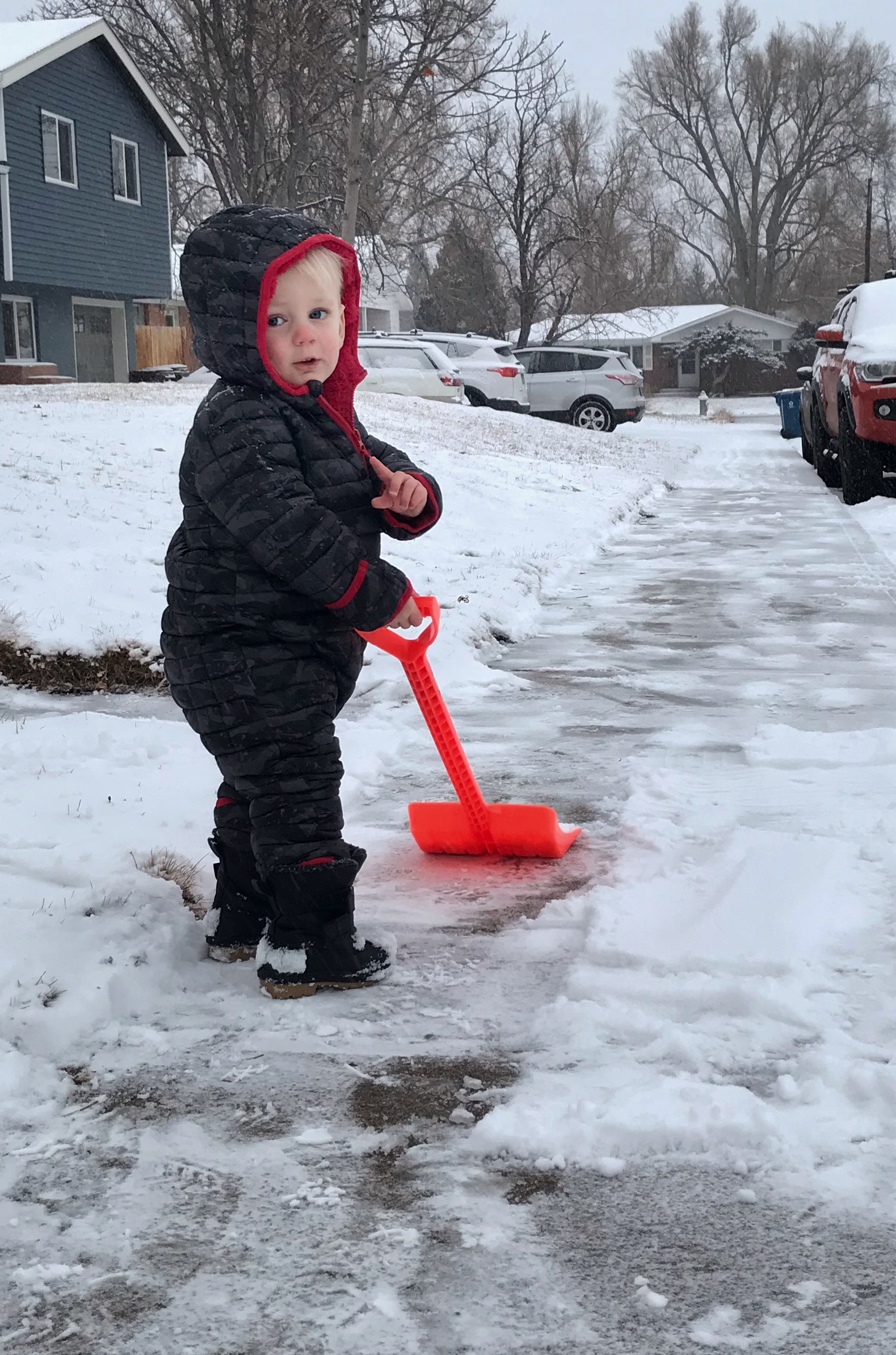 Owen shoveling snow